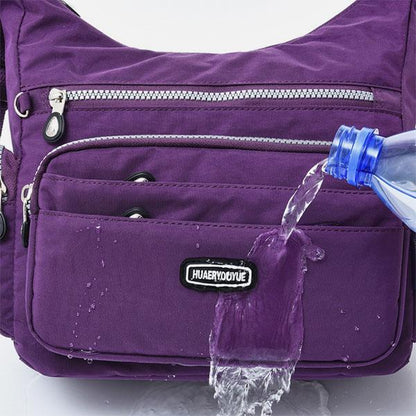 Borsa a tracolla multitasche in nylon impermeabile