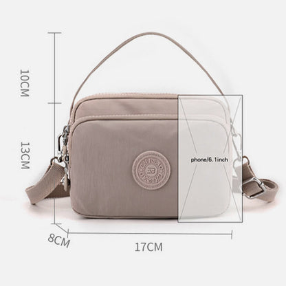 Small Nylon Crossbody Bag for Women – Triple Compartment Travel Purse